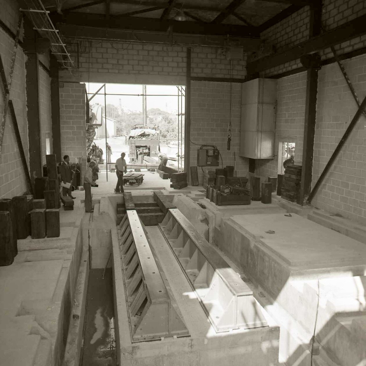 Inside the new engine hall: the foundation pit and bedplates cast and waiting.
